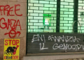 ”Eni complice del genocidio”: a Roma colpiti decine di negozi e auto della multinazionale